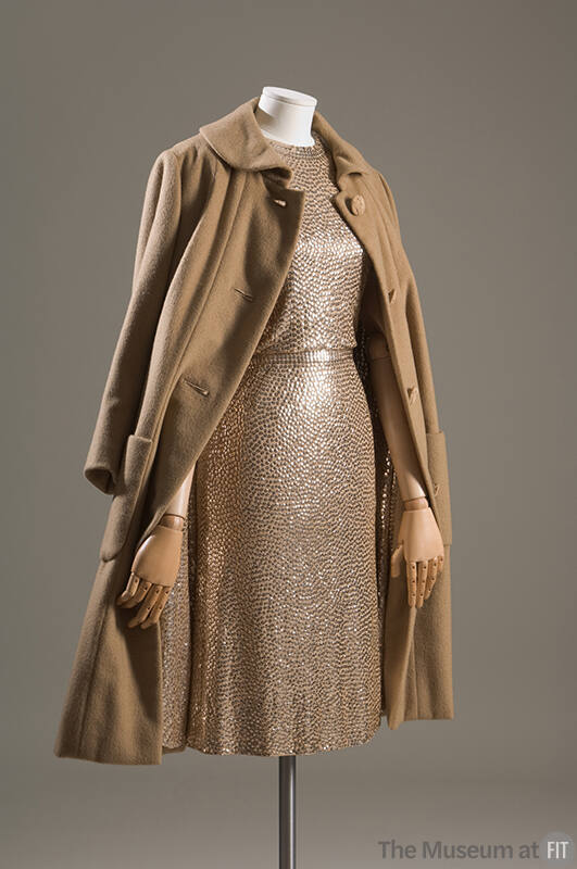Evening set of gold sequined sleeveless sheath dress and matching camel coat with same sequined…
