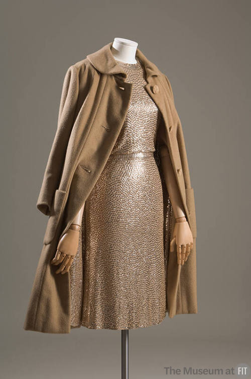 Evening set of gold sequined sleeveless sheath dress and matching camel coat with same sequined…