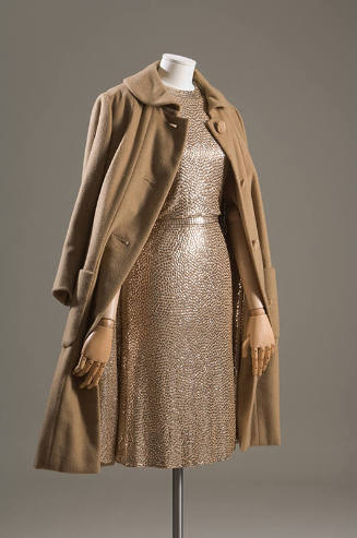 Evening set of gold sequined sleeveless sheath dress and matching camel coat with same sequined…