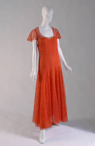 Orange floor length openwork evening dress made of small diamond cut pieces with cap sleeves