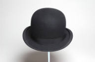 Man's black bowler hat