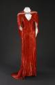 Red beaded floor length V-neck evening dress with short train and matching capelet with rhinest…