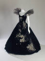Black strapless two-piece dress with wide floor length flared skirt and oversize tulle ruffles …