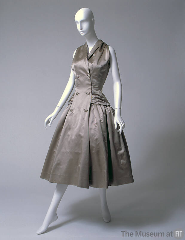 Beige sleeveless, knee-length evening dress with double breasted coatress styling