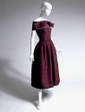 Dark purple strapless cocktail dress with bell skirt and matching narrow shoulder stole with tw…