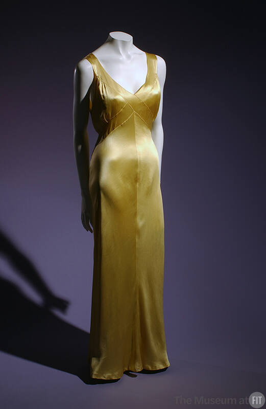 Floor-length sleeveless yellow slip dress with v neck