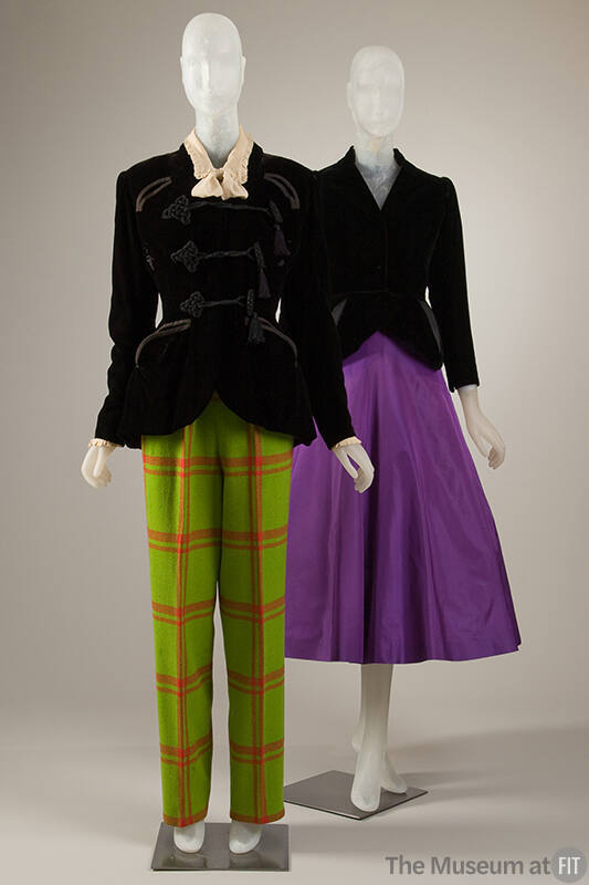 Two ensembles, both with black collard jackets. One has lime green and pants with red window pa…