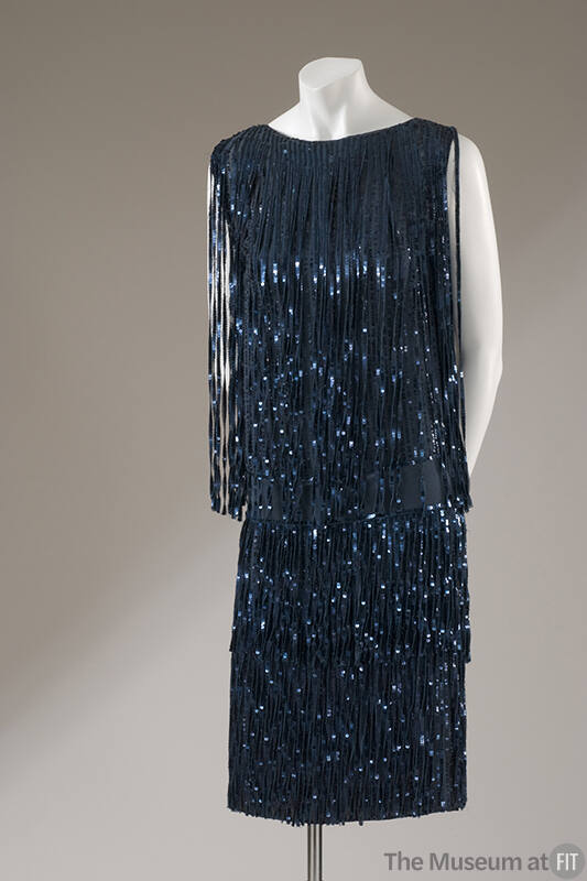 Sleeveless blue knee-length dress; blue sequins fringe strips 