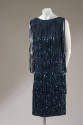 Sleeveless blue knee-length dress; blue sequins fringe strips 