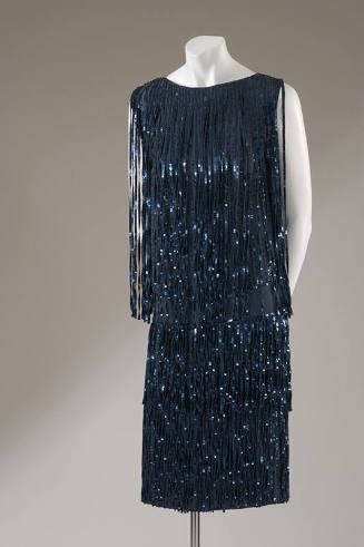 Sleeveless blue knee-length dress; blue sequins fringe strips 
