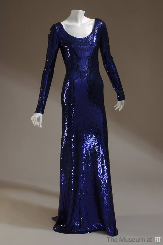 Floor-length dark blue sequined dress with scoop neck and long sleeves
