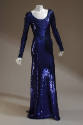 Floor-length dark blue sequined dress with scoop neck and long sleeves