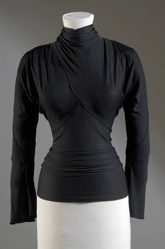 Black long sleeve blouse with wrap style front that crosses over bust 