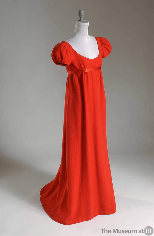 Red floor length evening dress with short puff sleeves, high empire waist trimmed with red sati…