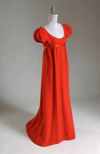 Red floor length evening dress with short puff sleeves, high empire waist trimmed with red sati…