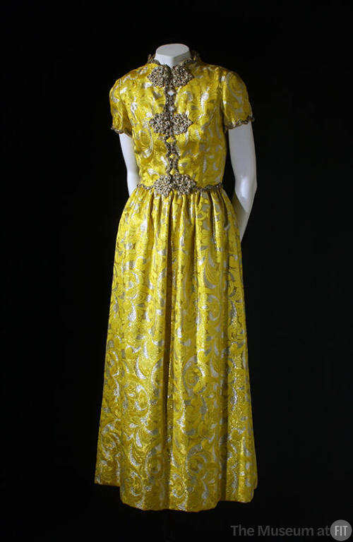 Yellow brocade, short sleeved evening dress with beaded silver metallic trim