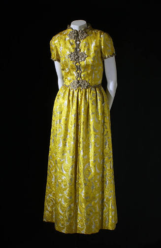 Yellow brocade, short sleeved evening dress with beaded silver metallic trim