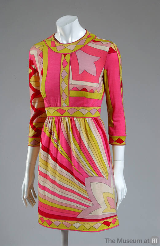 3/4 sleeve knee length dress with print of pink, yellow, and white rays emanating from a pink f…