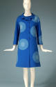 Blue 7/8 sleeve A-line coat with two tone medium blue and light blue inset circles in a random …