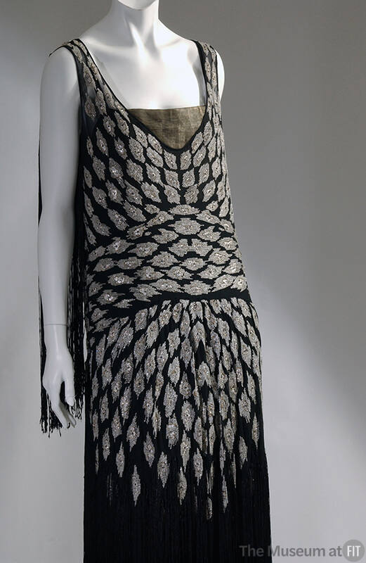 Sleeveless black evening drop waist chemise with crystal beads and rhinestones applied in diamo…