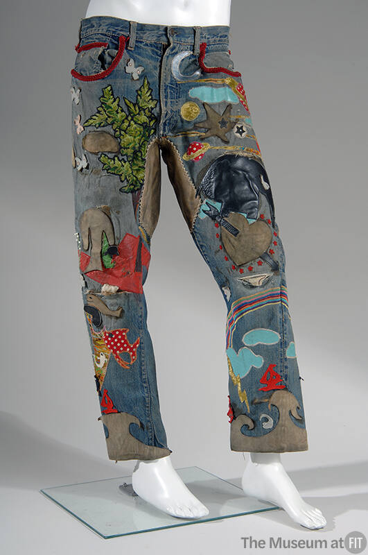 Embellished blue denim jeans with multi-color applique, beadwork, embroidery, rhinestones, and …