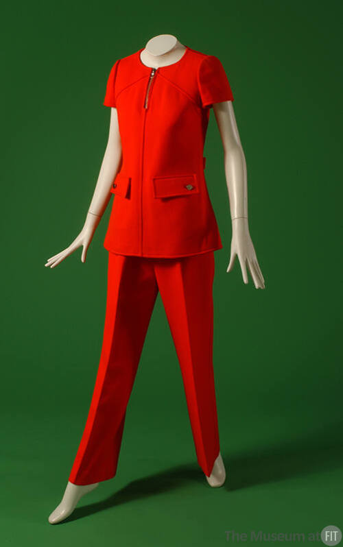 Red, structured pantsuit with short sleeve top, flap pockets, and flared leg pants