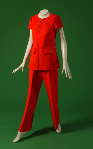 Red, structured pantsuit with short sleeve top, flap pockets, and flared leg pants