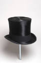 Men's black top hat with flared crown and brim rolled at sides