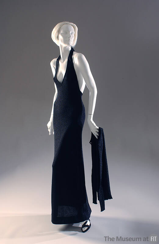 Black rib knit cardigan sweater and matching floor length V neck, halter gown