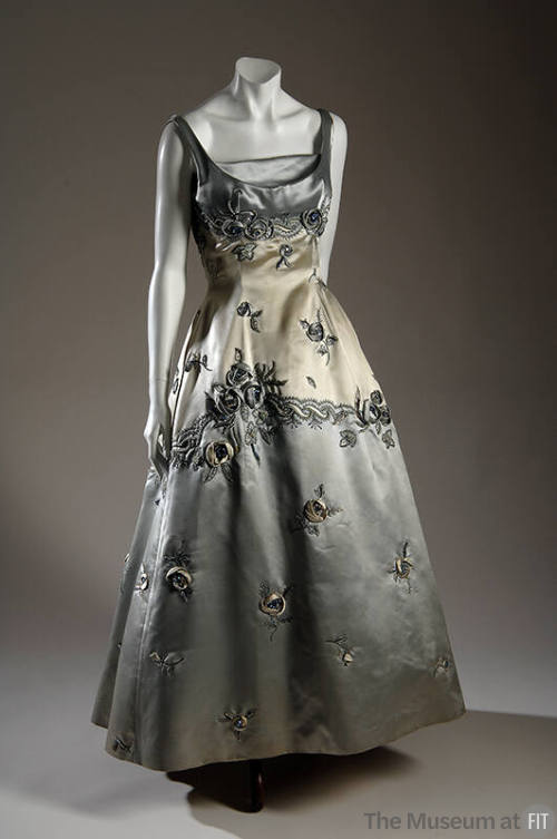 Sleeveless pale ice blue satin evening gown with 3D roses, pearls, rhinestones and metallic thr…