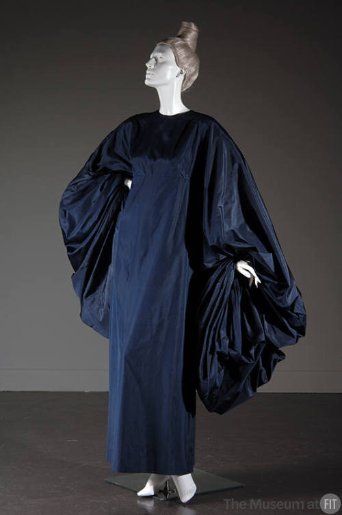 Floor length navy blue dress with voluminous sleeves
