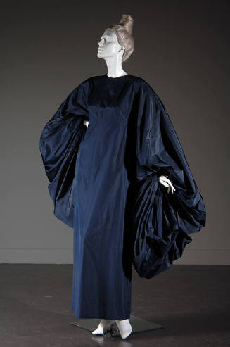 Floor length navy blue dress with voluminous sleeves
