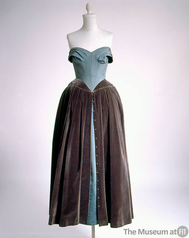 Strapless floor length evening dress with blue bodice and full grey/green skirt with blue under…