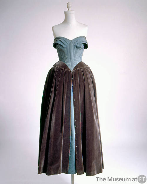 Strapless floor length evening dress with blue bodice and full grey/green skirt with blue under…