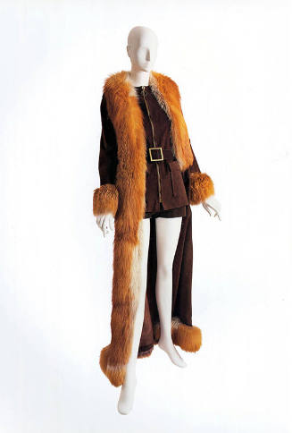 Brown suede zip front vest, hot pants and floor length coat with orange fur trim and cuffs