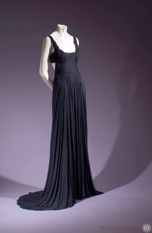 Navy blue silk pleated floor length evening dress, sleeveless with braided straps
