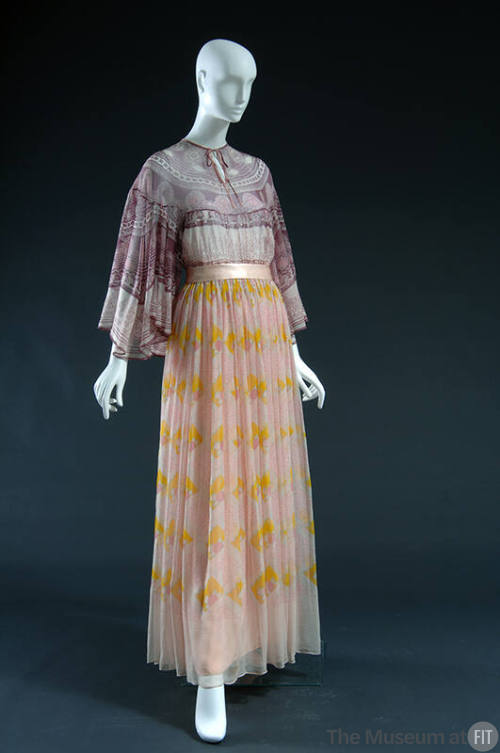 Dress with pink and off-white peasant style long sleeve top and yellow, pink and blue floral fl…