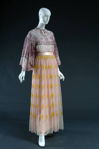 Dress with pink and off-white peasant style long sleeve top and yellow, pink and blue floral fl…