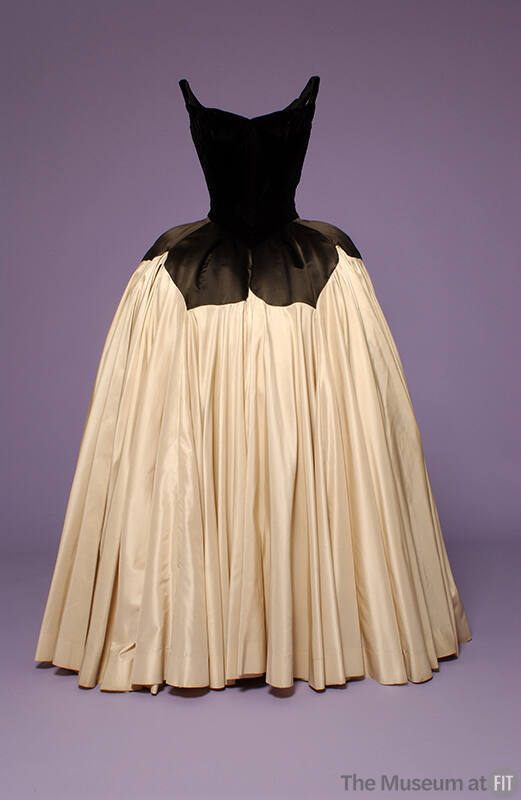 Ballgown with black velvet bodice and off-white gathered wide floor length skirt