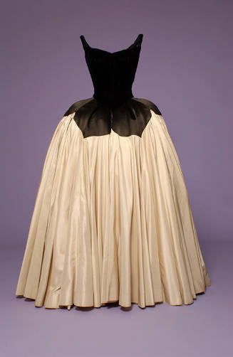 Ballgown with black velvet bodice and off-white gathered wide floor length skirt