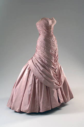 Pink strapless ball gown with fully pleated bodice and gathered skirt