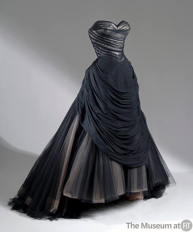 Black strapless ballgown with pleated bodice and apron and full skirt