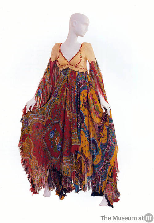 Multicolor floral pattern floor length dress with beige leather bodice with red stitching 