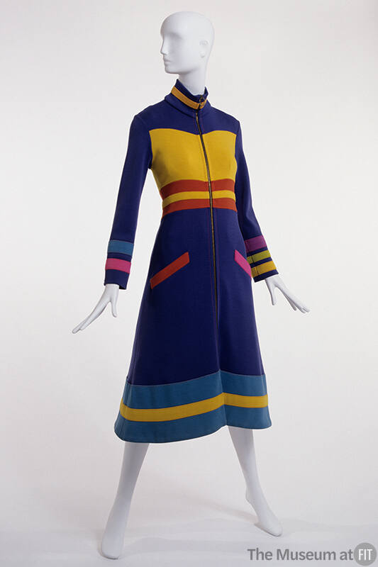 Blue knee length coat dress with high stand collar and yellow, red, light blue, pink, purple an…