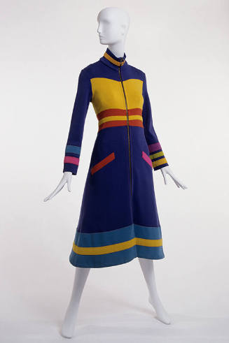 Blue knee length coat dress with high stand collar and yellow, red, light blue, pink, purple an…