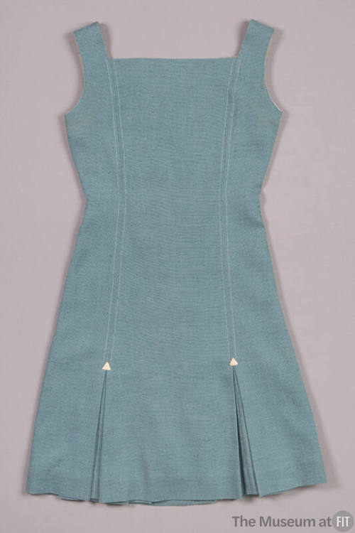 Light blue sheath mini dress with square neck and kick pleat hem 