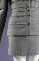 Soft gray armor suit with horzontal tucks and decorative buttons and matching skirt