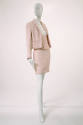 Stylized Chanel suit: cropped jacket, short skirt and boned corselet in pink textured tweed; wh…