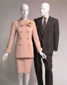 pink double breasted suit and matching skirt; mens suit with tie 