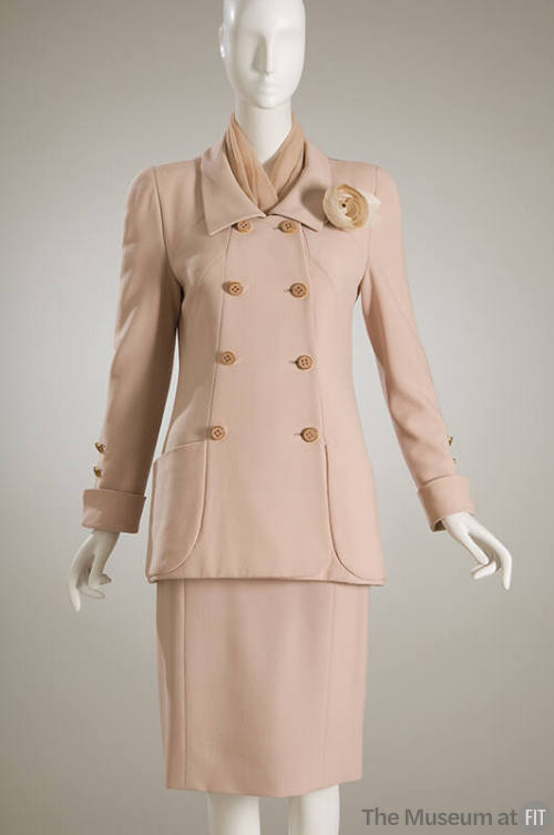 pale rose double breasted jacket, matching skirt, and artificial rose on collar